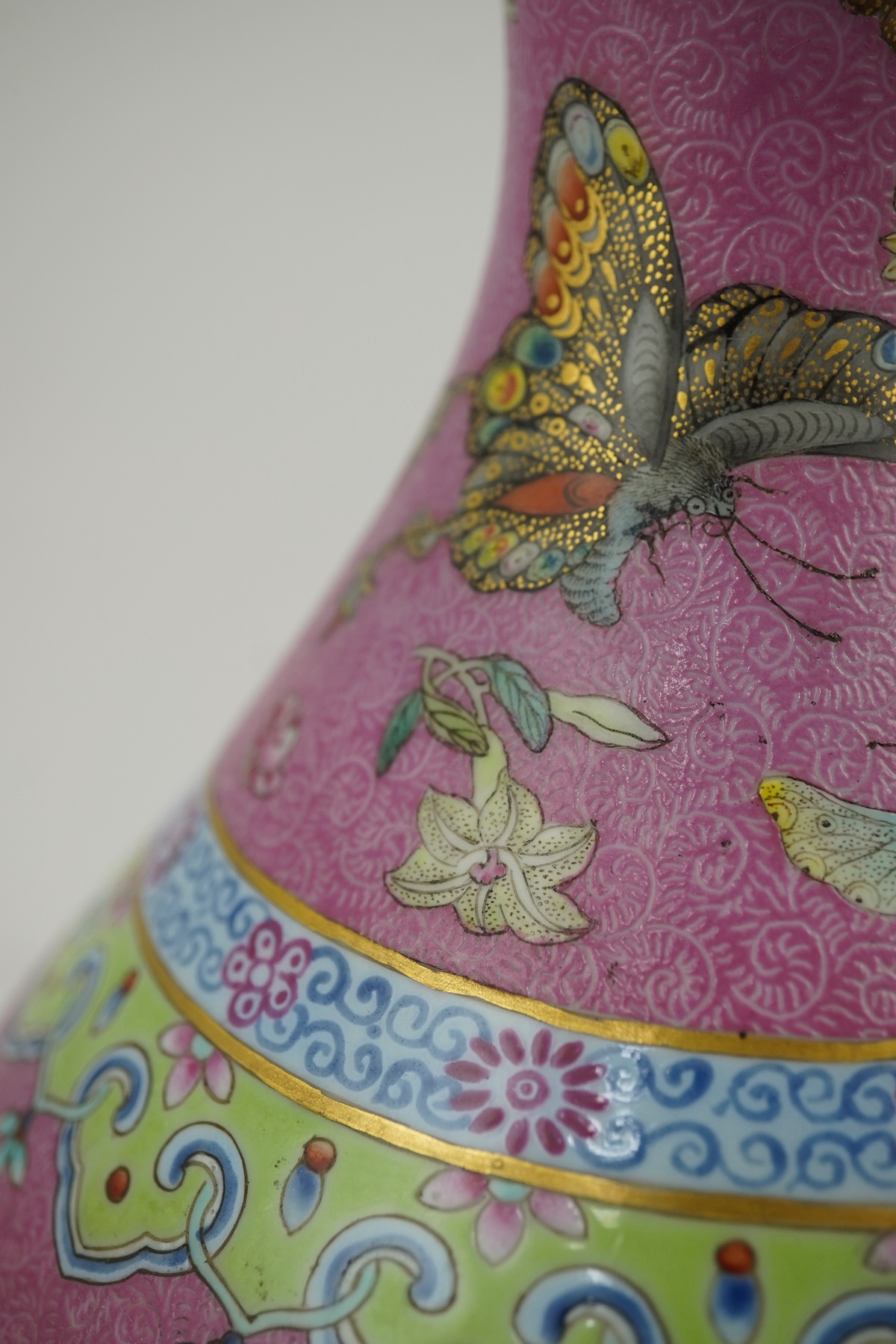 A Chinese pink-ground sgraffito pear-shaped vase, yuhuchunping, Daoguang six character seal mark and of the period (1821-50)